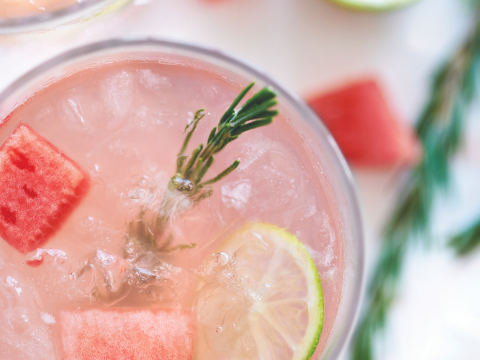 Watermelon-rosemary flavored water in a glass. 
